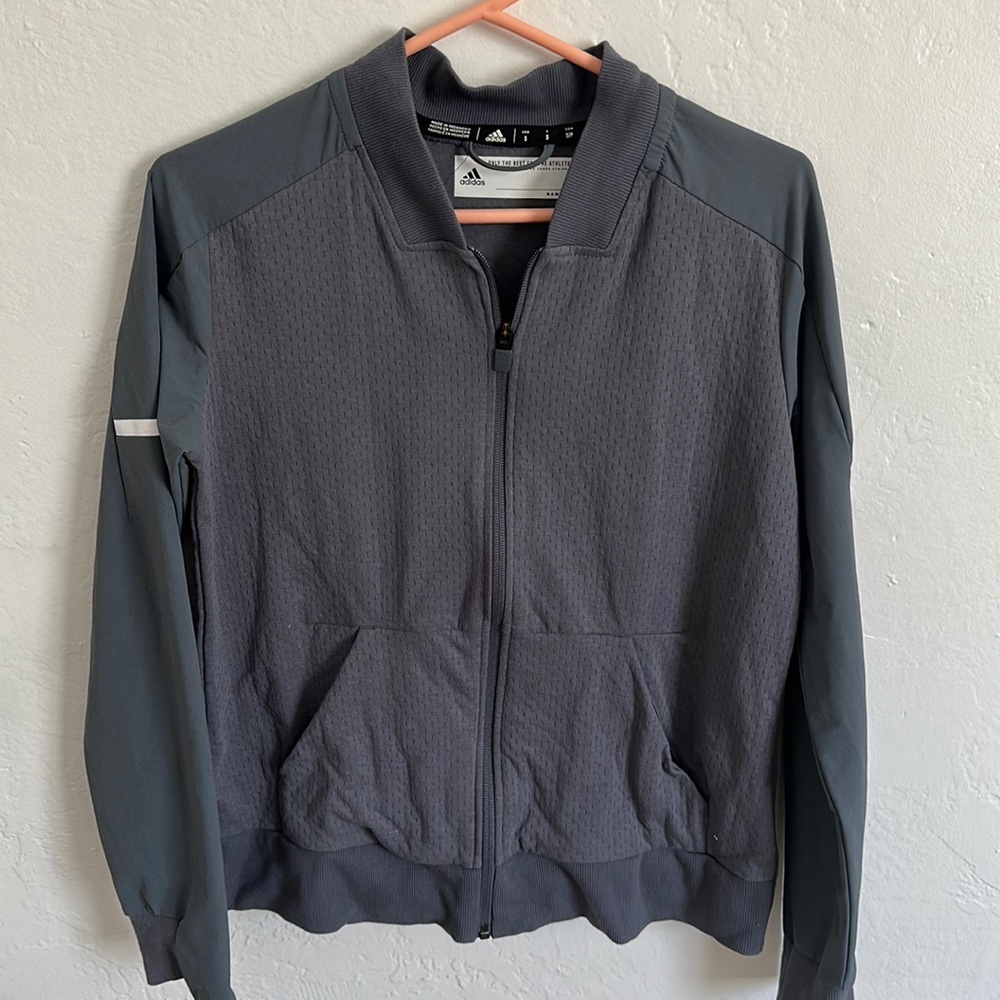 Hoodless jacket, teal blue.
